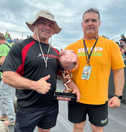 Bronze Trophy held by coaches