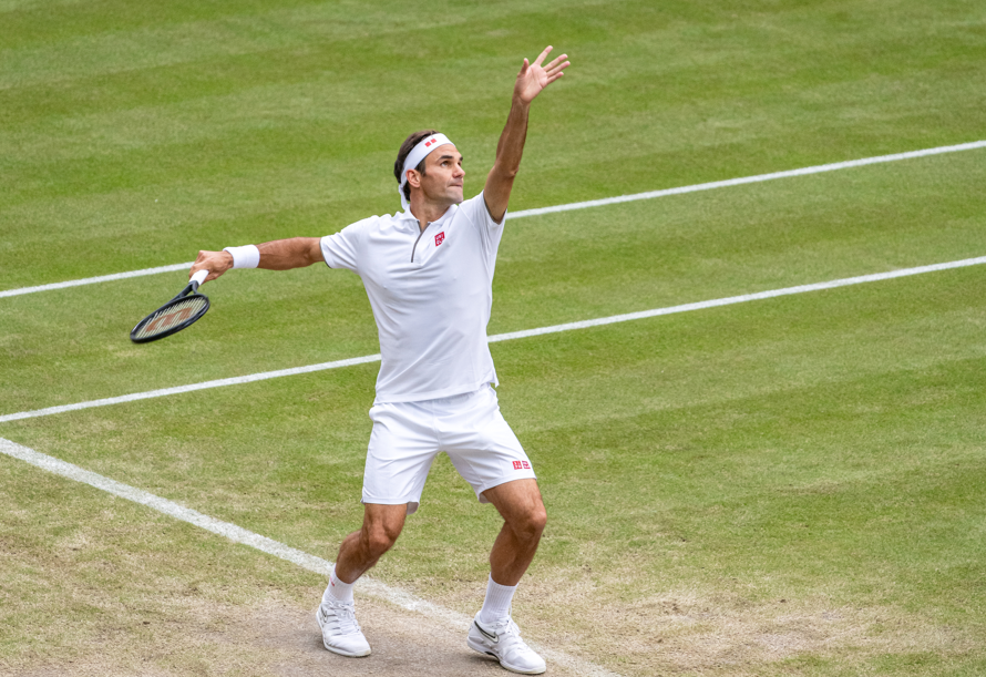 Roger Federer serving at Wimbledon Roger Federer serving at Wimbledon