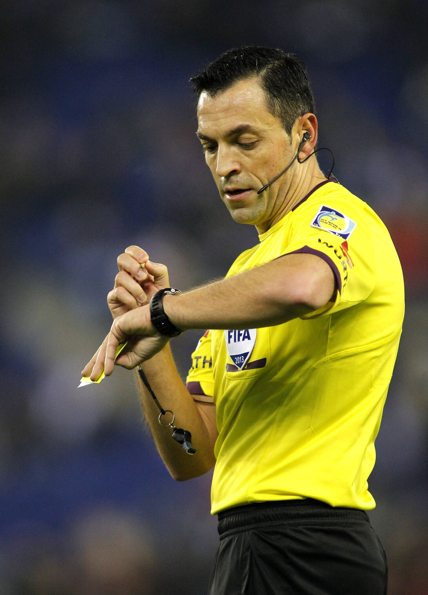 soccer referee checking his watch soccer referee checking his watch